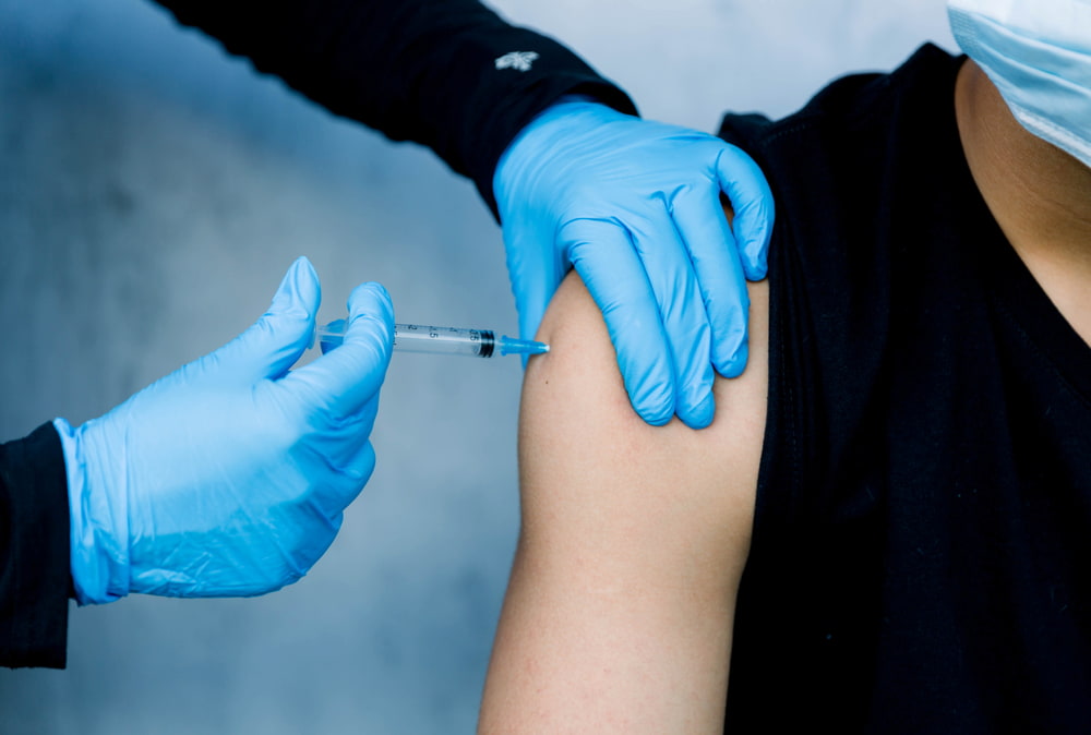 patient getting an arm injection